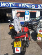CBT Certificate - Lauren passing on a bike supplied by Anderson & Wall